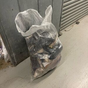 Used shoes men and women in a bag some new shoes never worn